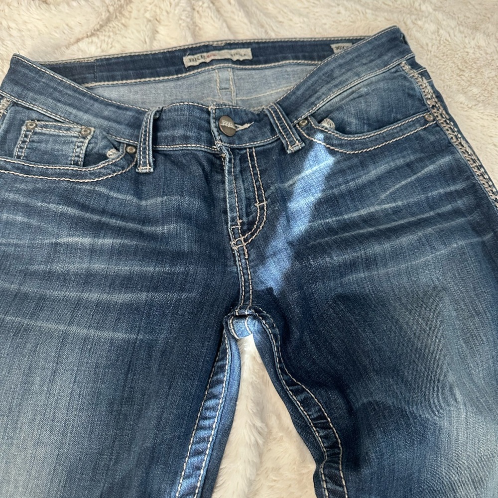 3 pairs of buckle jeans 30XXL one pair is Miss me and other two is BKE